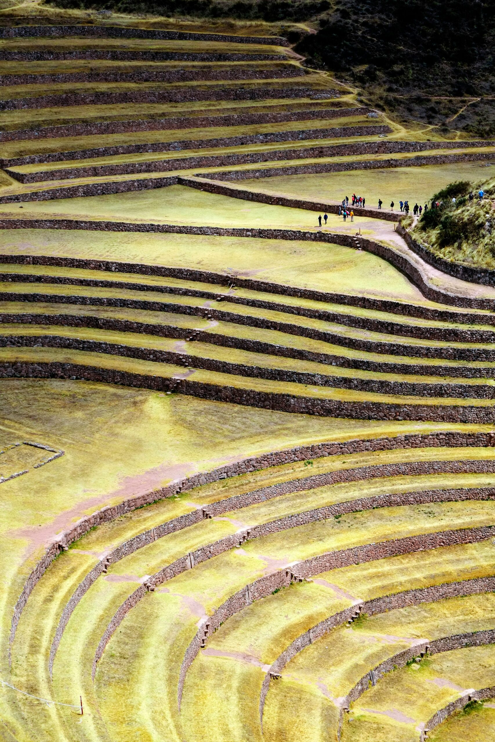 Moray circular agricultural terraces from above, Sacred Valley Peru, concentric Inca engineering destination overview